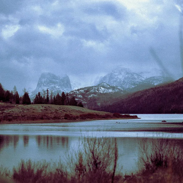 A mountain lake under a wide sky