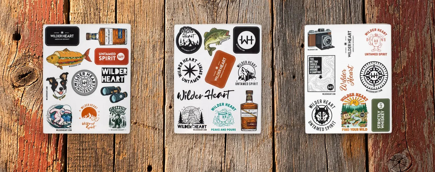 All three Wilder Heart sticker sheets side by side on barn boards
